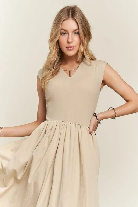 Discover the ADORA V-Neck Cap Sleeve Dress: Simple Elegance
